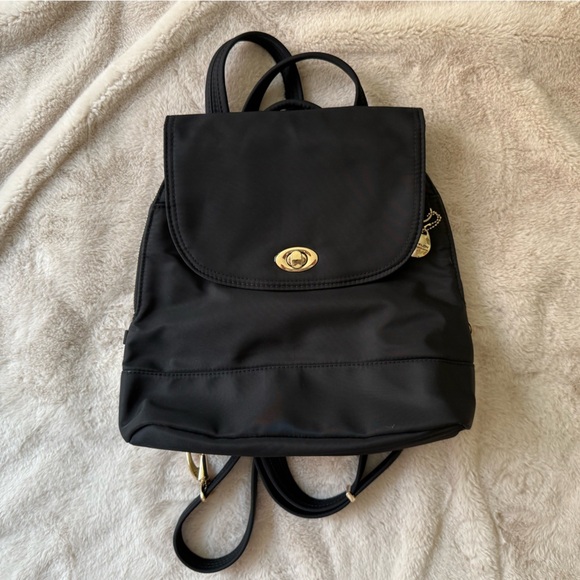 Travelon Anti-Theft Small Tailorer Backpack Black with Magenta Lining - Picture 1 of 11